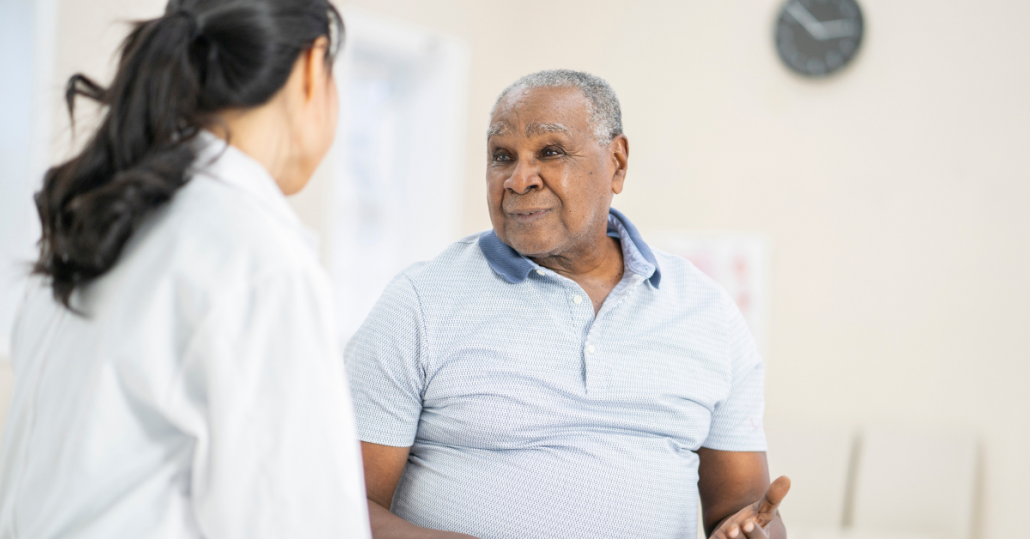 man speaking with oncologist about prostate cancer